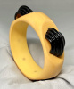 BB249 rounded square maize bakelite bangle with black decoration